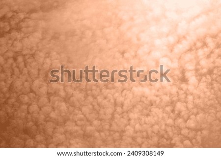 tender fluffy soft clouds the color of peach fluff. Royalty-Free Stock Photo #2409308149