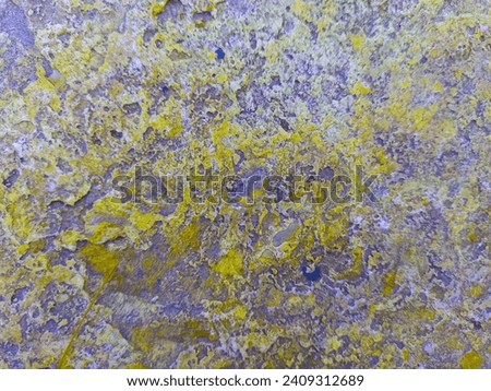 Purple and yellow grunge banner. Stone texture background. Gray and brown rock background. Close-up rock background.