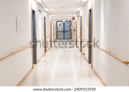 Long hospital bright corridor with rooms. Medical concept. Hospital corridor with rooms.
