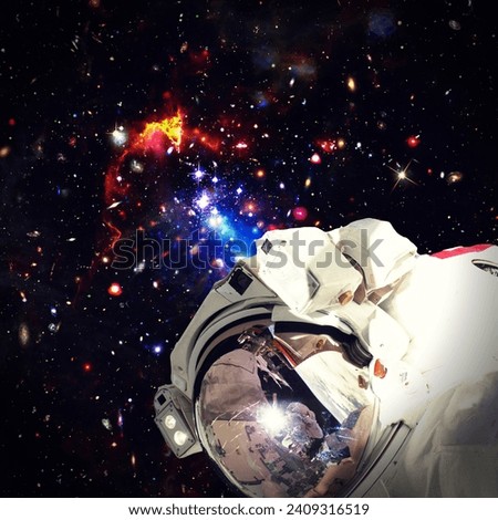 Astronaut flies in space. The elements of this image furnished by NASA.

