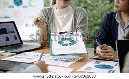 Carbon offset price report CO2 emission. Future growth Net zero waste in ESG ethical SME office protect climate change global warming social issues project. Group of asia people Eco friendly SDGs plan Royalty-Free Stock Photo #2409362833