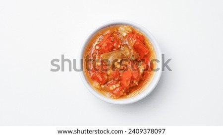 chili and garlic chili sauce with oil on a white plate