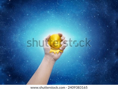 holding gold coins on the starry background success concept