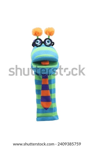 little funny sock puppet isolated on white background. hand theater soft toys collection. space for text. top view. high resolution close up. studio shot.