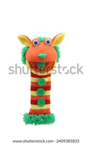 little funny sock puppet isolated on white background. hand theater soft toys collection. space for text. top view. high resolution close up. studio shot.