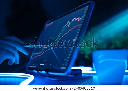 Stock market or forex trading graph and candlestick chart suitable for financial investment concept. Royalty-Free Stock Photo #2409405519