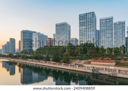 The modern urban architecture skyline and ancient canal scenery of Beijing, the capital of China
