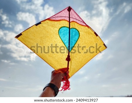 Kites flying in the cloudy blue sky. high resolution