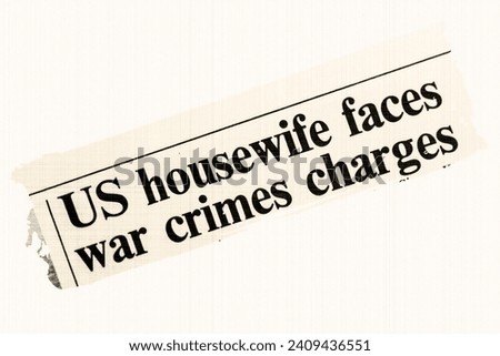 US housewife faces war crimes charges - news story from 1975 UK newspaper headline article title in sepia Royalty-Free Stock Photo #2409436551