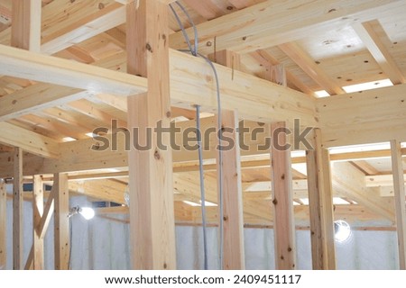 Beams and pillars at the construction site of wooden houses