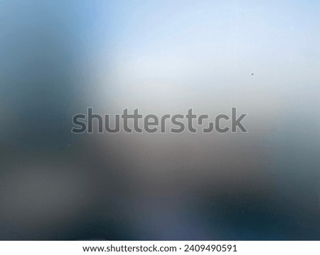 photo view of a blur out of focus background textured texture wall paper in grey gray color full frame screen background
