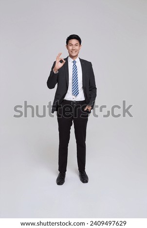 asian business people man good looking in studio. portrait businessman in grey suit confident show okay gesture, approve plan isolated on white background.