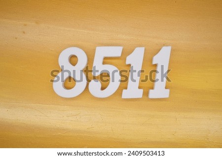 The golden yellow painted wood panel for the background, number 8511, is made from white painted wood.