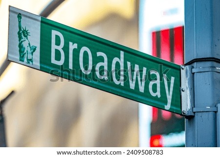 A sign indicating the famous Broadway street which is part of a district of Manhattan, in the Big Apple of New York (USA). Royalty-Free Stock Photo #2409508783
