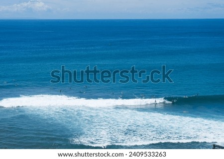 Indonesia Bali Suluban Beach (Blue Point) - Surfer on the wave