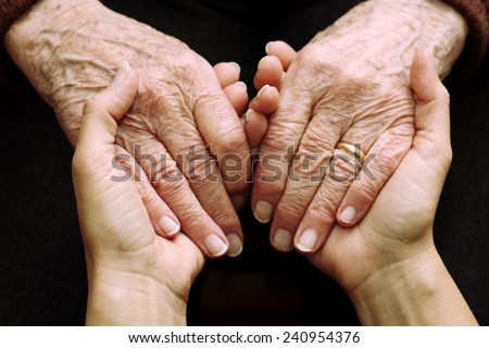 Support and help the elderly Royalty-Free Stock Photo #240954376