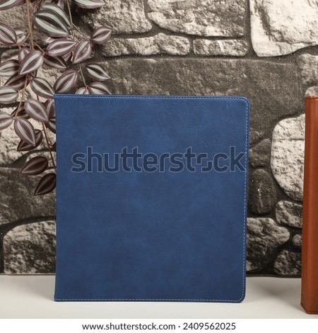 Personalized binding, leather folder cover, leather binding, binder, binder, office binding, corporate gift. Concept shot leather binding, top view, colorful Royalty-Free Stock Photo #2409562025