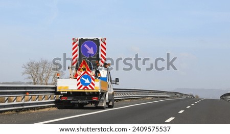 truck and road works on the highway without people during maintenance