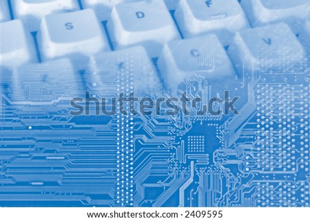 blue background with electronic circuit and keyboard