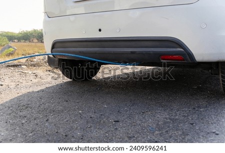 pollution checking of car under progress at national highway at day Royalty-Free Stock Photo #2409596241