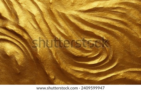 Gold Paint Textures are perfect for adding drama and intensity to graphic design projects Royalty-Free Stock Photo #2409599947