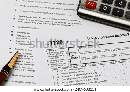 Corporation income tax form 1120. Tax reform, corporate tax code, and tax evasion concept.