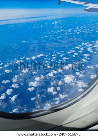 A lot of small clouds photographed from an airplane