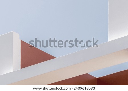 Abstract architecture background. Close-up of a geometric wall structure design. Contemporary and minimalist architectural photography detail. Vintage filter colors. Cement volumes composition. pastel
