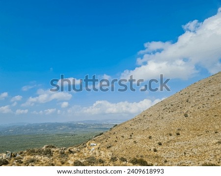 Big rock hills with blue sky background on Greece island resort