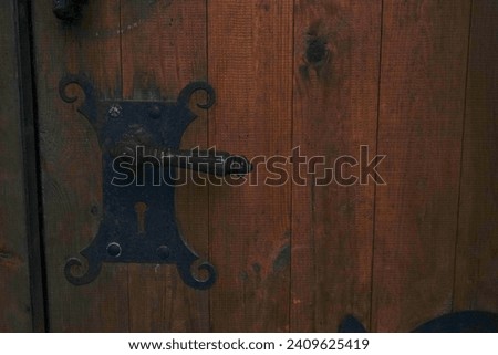 Ancient wooden doors of the Palanok castle, background. Ukraine Mukachevo. 