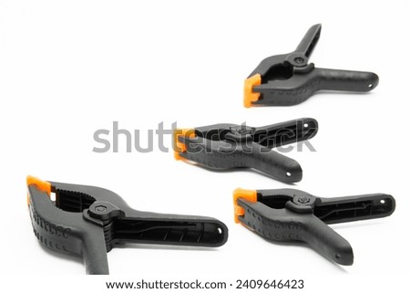 Group of plastic string clamps isolated on white background copy space 