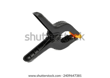 Plastic string clamp tool isolated on white background