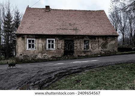 Miedzianka, former town, now a village. A former mining center.
Old houses from their heyday. Royalty-Free Stock Photo #2409654567