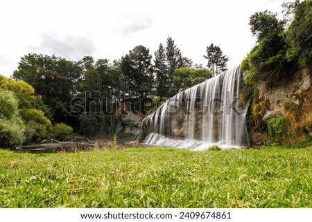 An image of Rere Falls a waterfall located just out of Gisborne in New Zealand. This is a long exposure image with a long shutter speed