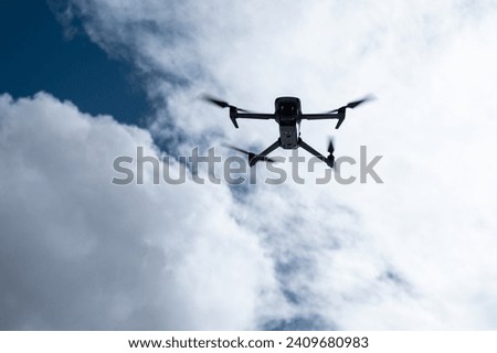 Flying drone in high altitude snow mountains