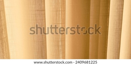 "Radiant and welcoming, this sunlit house curtain creates a warm and inviting atmosphere. Purchase this image and illuminate your projects with luminosity and comfort!" Royalty-Free Stock Photo #2409681225