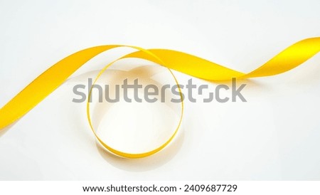 Abstract shape color yellow ribbon isolated on white background.