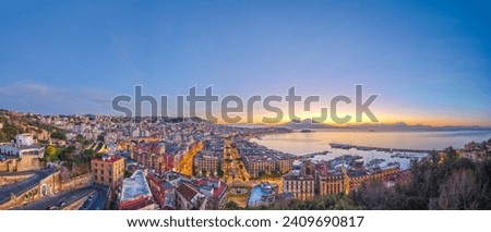 Naples, Italy aerial skyline on the bay with Mt. Vesuvius at dawn. Royalty-Free Stock Photo #2409690817