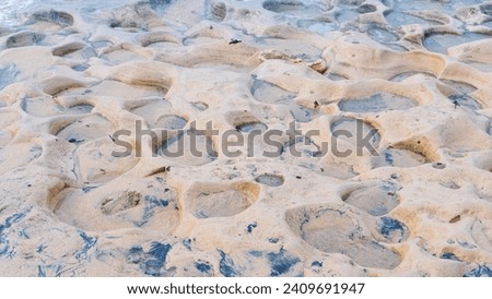 sea ​​stone texture on a calm beach