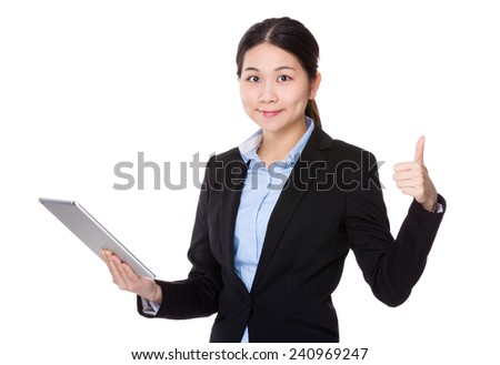 Businesswoman use of tablet and thumb up