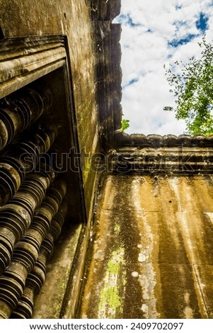 The mystery rock window in ancient Khmer traditional of Angkor Wat, Siem Reap of Cambodia