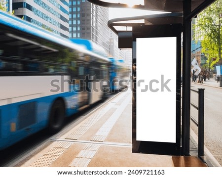 Blank white Media Advertising banner sign at Bus stop City street Mock up board template