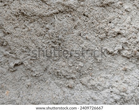 Walls covered with sand and cement
