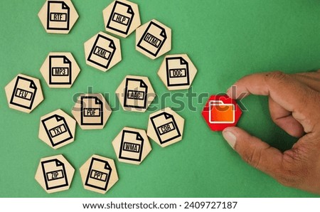 hexagon with file icon PDF AAC PPT RTF CDR ZIP FLV WMA XML HTML HLP TXT DOC MP3. DMS management. file management concept Royalty-Free Stock Photo #2409727187