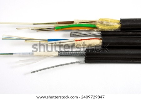 Structure of Figure (8) and ADSS Optical Fiber Cables isolated on white background. They consist of messenger wire OFC cables with and without steel armor. Royalty-Free Stock Photo #2409729847