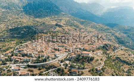 Arachova, Greece. Arachova is a small town in Greece, in the community of Distomon-Arachova-Andikira. Sunny weather with clouds. Summer, Aerial View  
