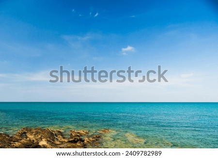 Beautiful horizon landscape view point tropical summer rock sea ocean white beach blue sky blackground nature calm wave water. wind blows cool clear look relaxed travel Thailand sun day time . 
