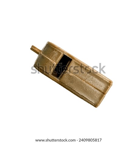 Brown whistle isolated on white background