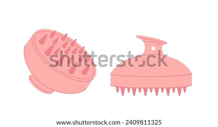 pink scalp massage brush set on a white background Royalty-Free Stock Photo #2409811325