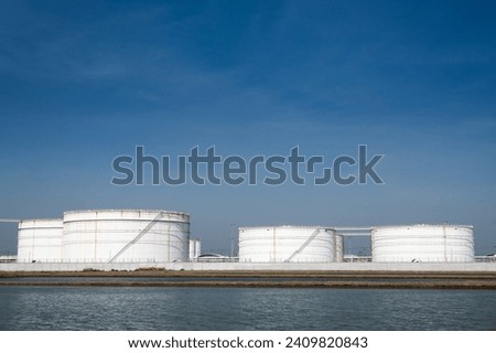 Large crude oil tanks are used to store crude oil, which is a type of unrefined petroleum. Crude oil is a thick, black liquid that is extracted from the ground